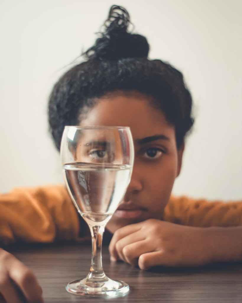 woman with glass of water